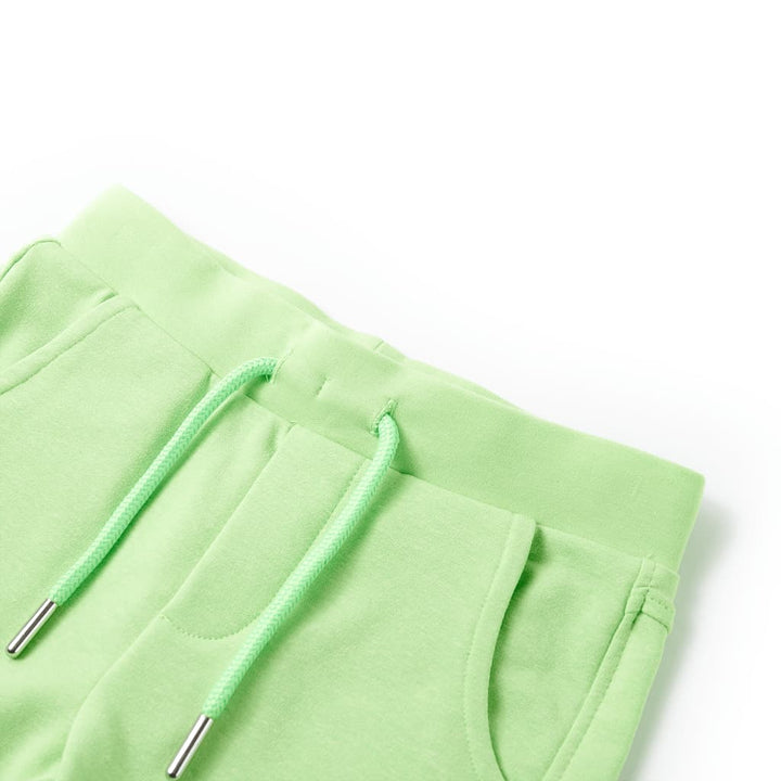 Kindershort 116 fluorescerend groen