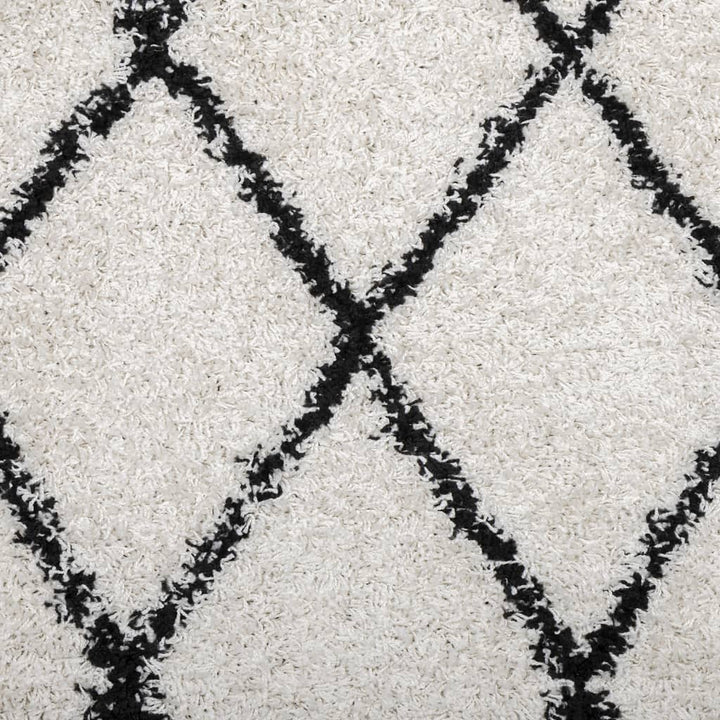 Vloerkleed PAMPLONA shaggy hoogpolig 140x200 cm crème en zwart