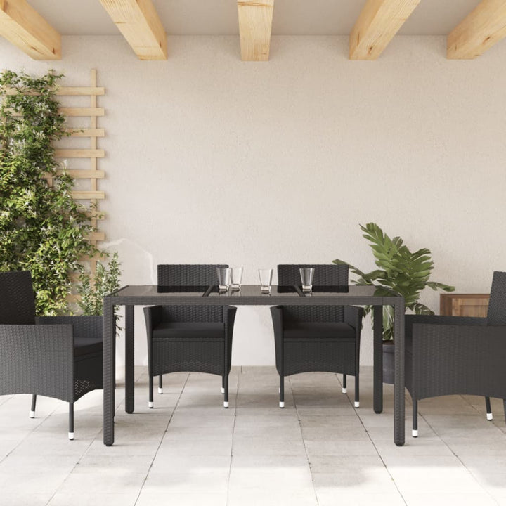 Tuintafel met glazen blad 150x90x75 cm poly rattan zwart