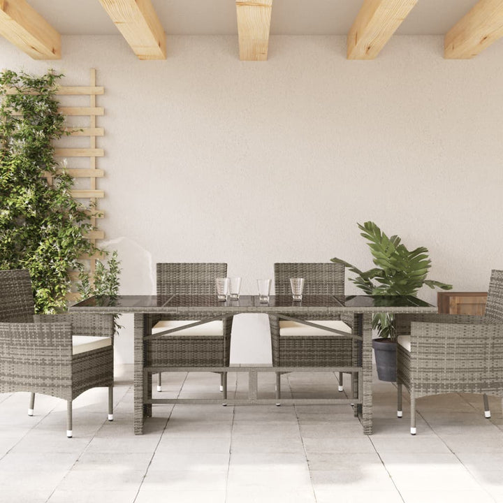 Tuintafel met glazen blad 190x80x75 cm poly rattan grijs